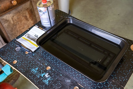 An acetone bath should remove all the grease residues from your device.